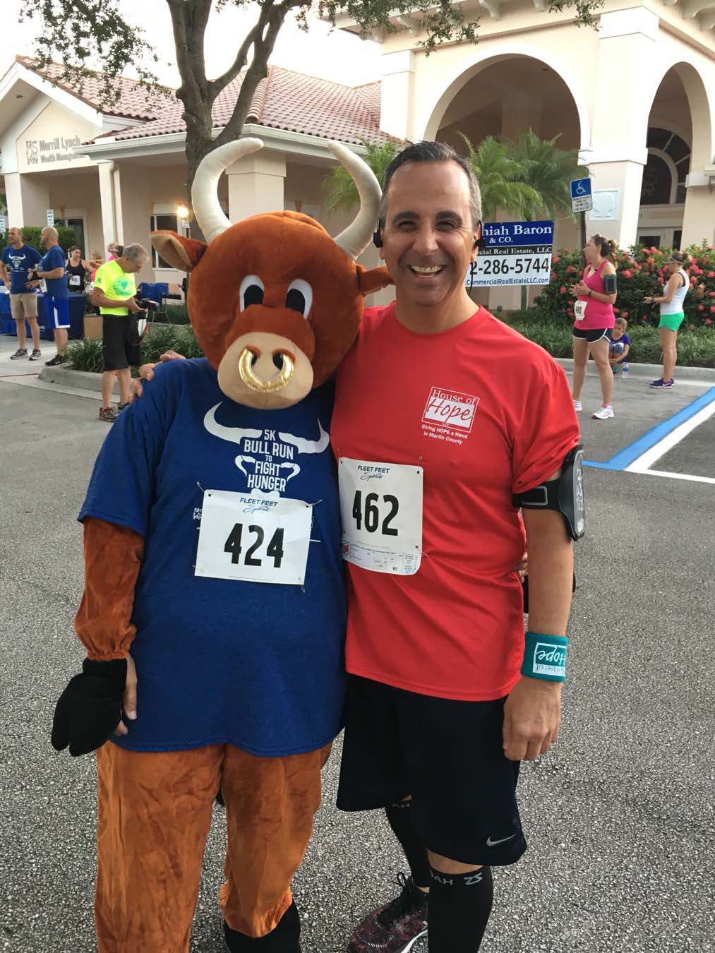Runner and bull mascot