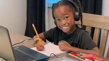 student at laptop